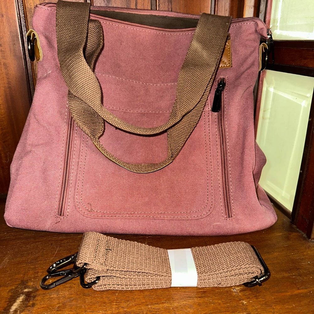Stylish Women's Canvas Bag with adjustable shoulder strap included. Never used.
